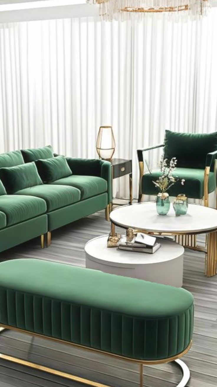 a living room filled with green couches and chairs next to a white coffee table