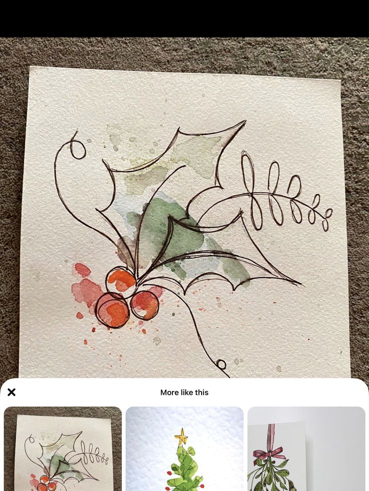 some watercolors are being used to make christmas cards