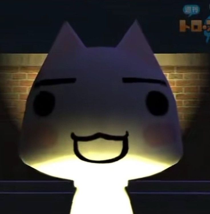 an animated cat with a smile on it's face is lit up in the dark