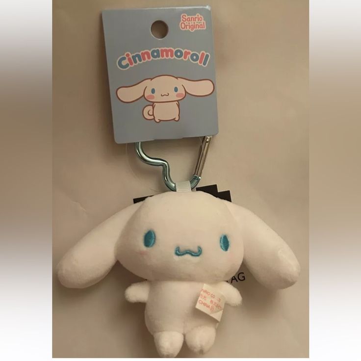 a stuffed animal with a tag attached to it