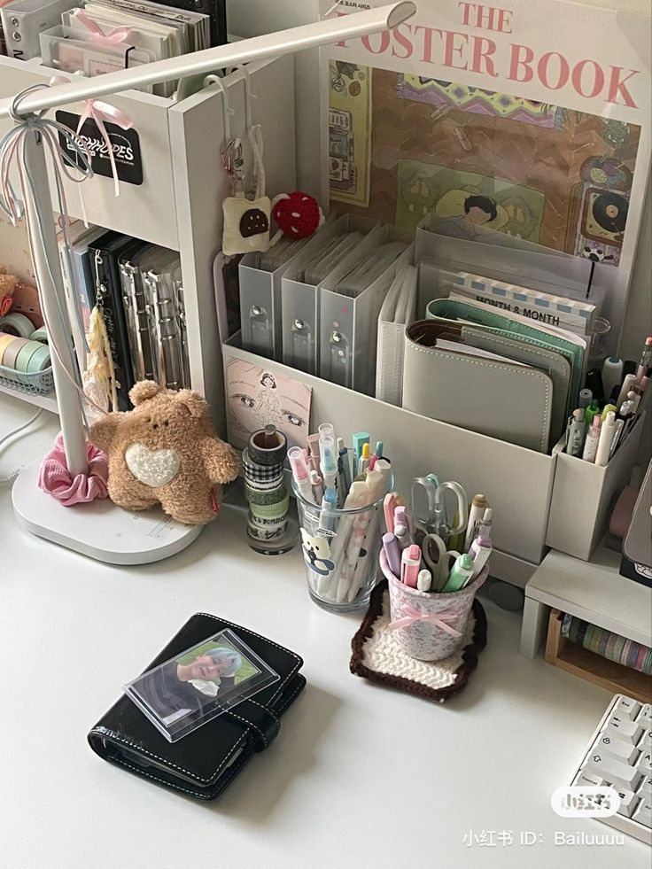 an office desk with various items on it