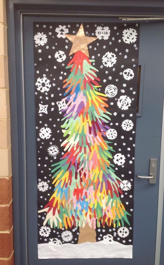 a decorated door with a christmas tree on it