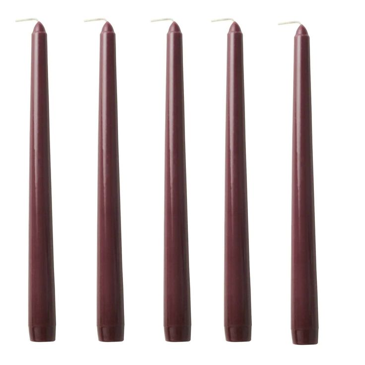 five candles are lined up in a row