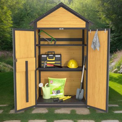 a garden shed with the door open and tools in it's storage compartment outside