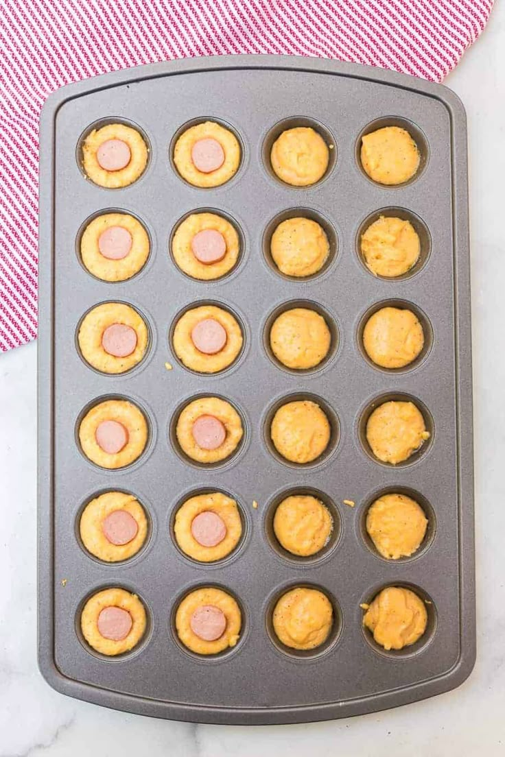 the muffins are ready to be baked in the baking pan on the counter