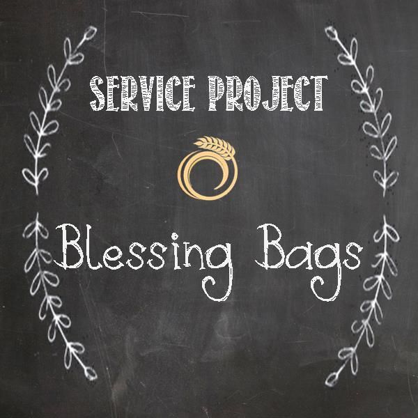 a chalkboard with the words blessing bags written in white on it and an image of a ring