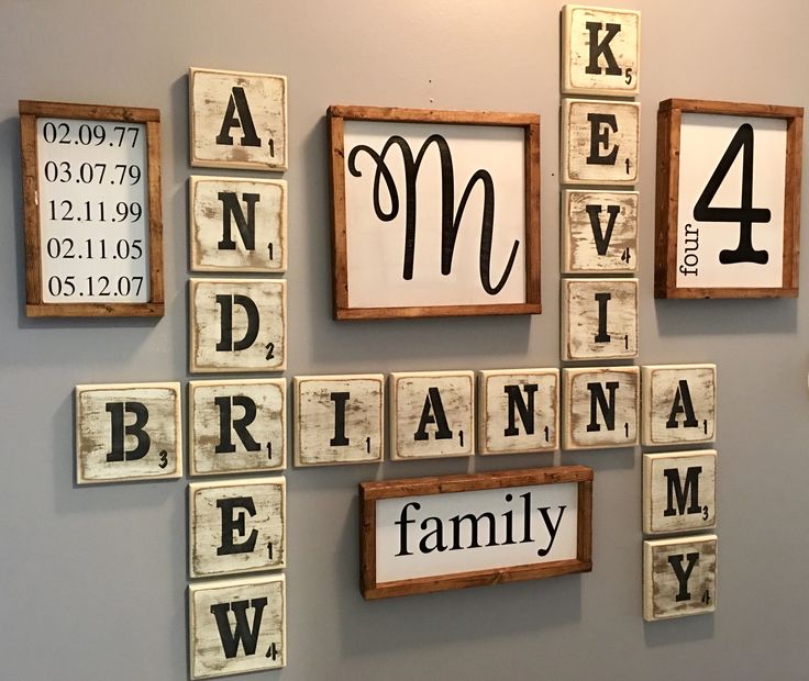 several wooden blocks are arranged in the shape of scrabble tiles with letters and numbers on them