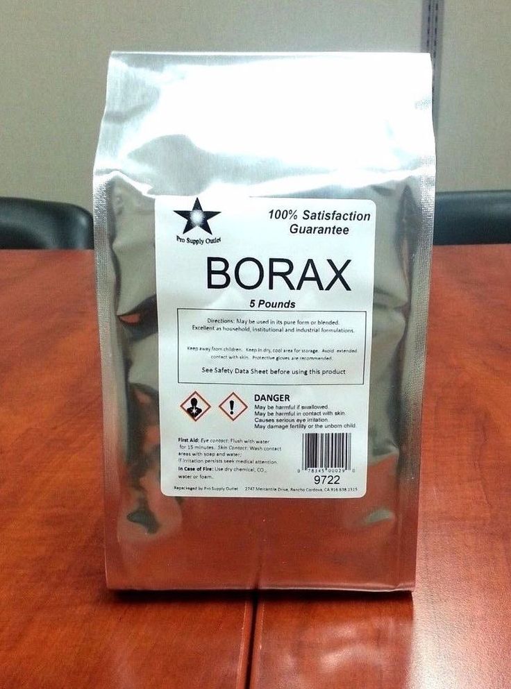 a bag of borax sitting on top of a wooden table