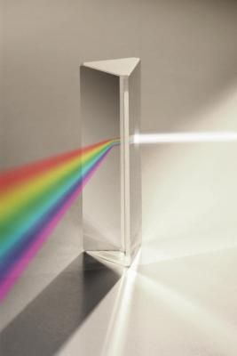 a white object with a rainbow light coming out of it