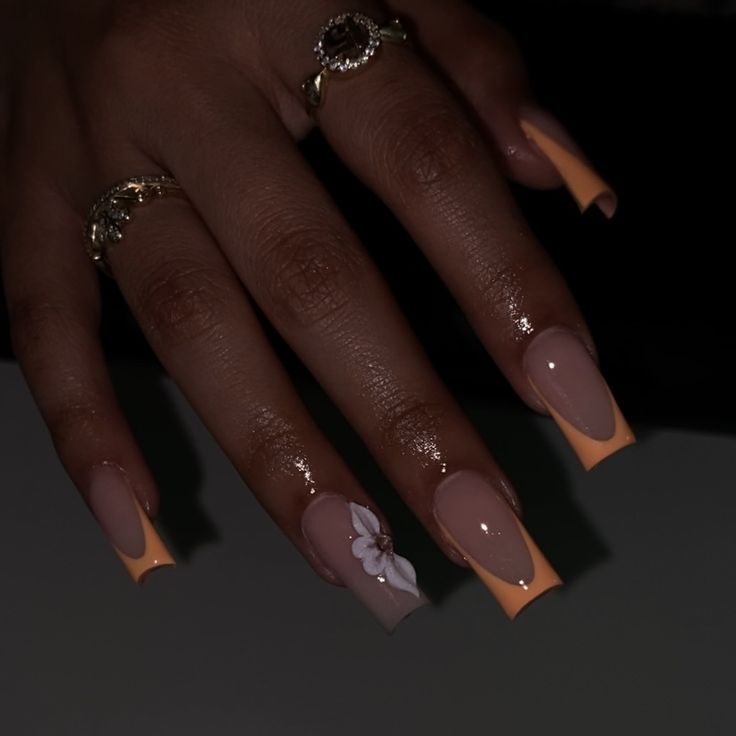 @nailsssbyem._ on instagram Square Nails With Flower Design, Holiday Flower Nails, Long Acrylic Nails Square Ideas Design, French Peach Nails, Peach Color Acrylic Nails, Orange Gel X Nails, Nails For Punta Cana, Orange Flower Nail Designs, Acrylic Nails Orange Design