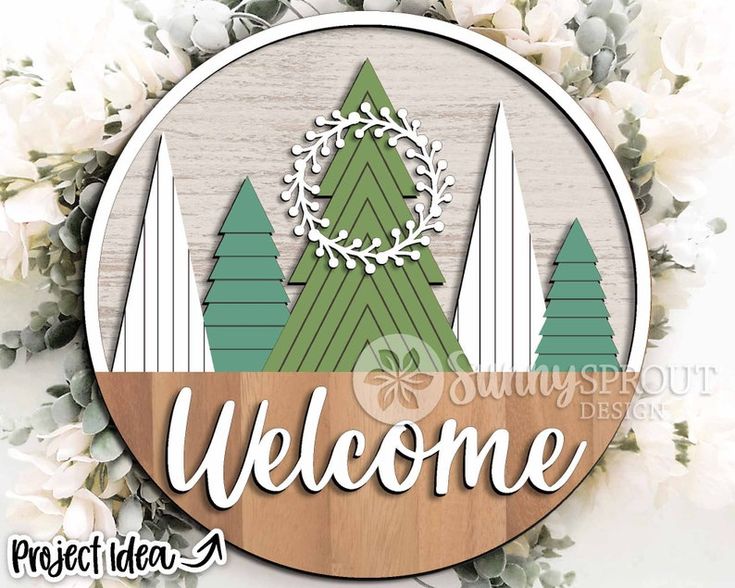 the welcome sign is surrounded by flowers and greenery in front of a wooden background