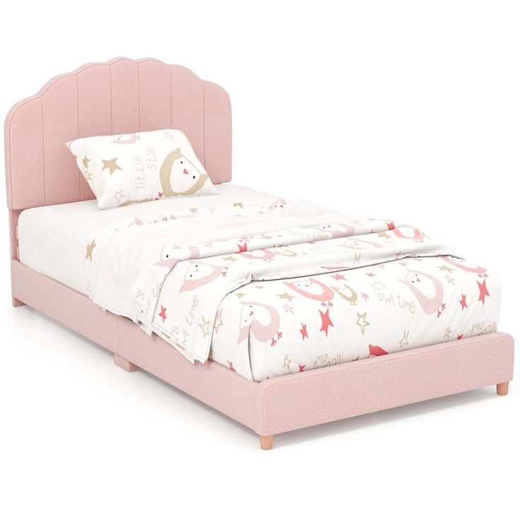 a bed with pink headboard and foot board