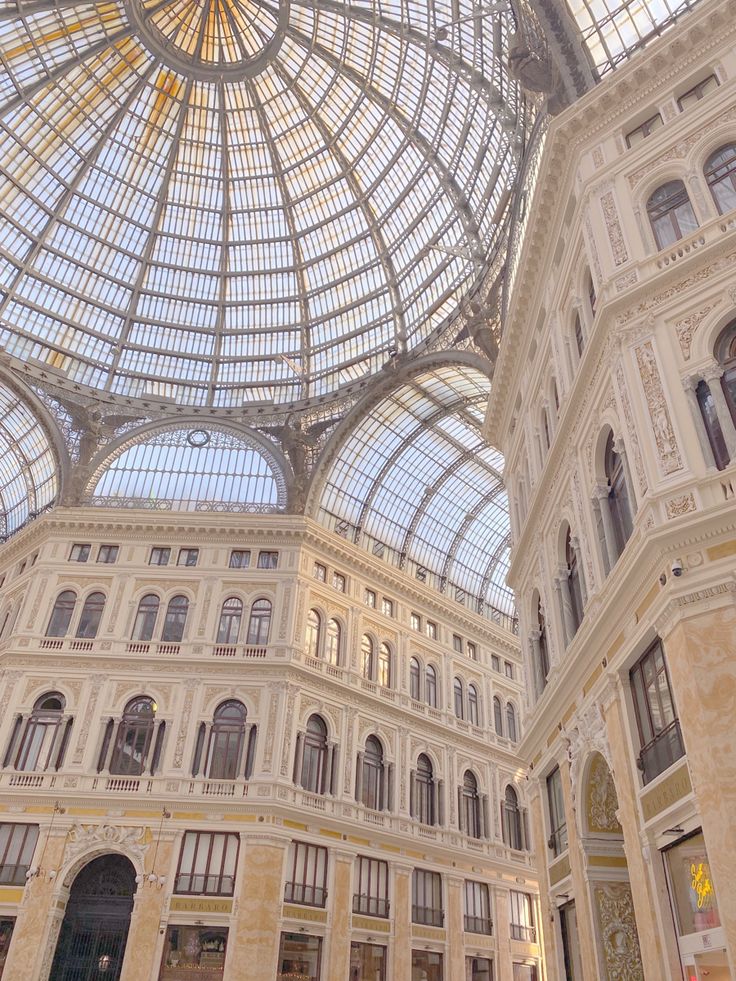 the inside of a large building with many windows