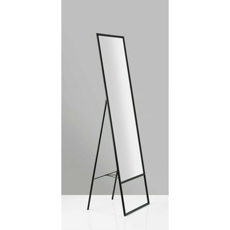 a mirror that is standing up on a stand in front of a gray wall with a black frame