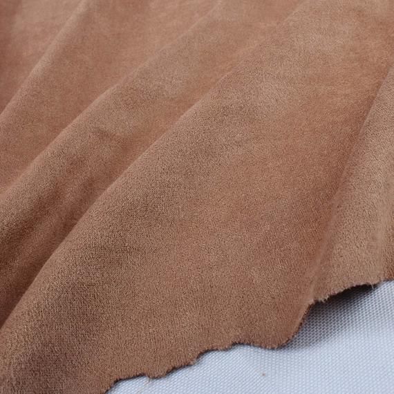 a close up view of a brown fabric