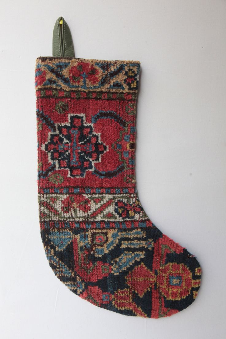 Here i am listing a Decorative Stocking made from  100% Handmade double knotted antique tribal rug. It has been professional washed before to make this stocking&socks. It is in Excellent Condition.  You can use in many place in your home decoration. Please you can compary my stocking with other ones you can easly find the differences, nobody using antique  rugs for stockings like me. All Of My Rugs, Kilims,stocking And Textiles Are Vintage And Unique, Mostly From Turkey and Turkish Ones. The Kilim Has Been Washed Via A Professional Washer. This listing is just for decorative stocking and the insert is not included. PLESE CONTACT ME FOR WHOLESALE TO GET BETTER PRICES. Apply only dry cleaning. Pillow size : 11 X 18 Inches Pillow size : 0,28 X 0,45 C meter. Stock Number : HB10923 Shipment: Wo Stocking Socks, Kilim Christmas Stocking, Family Stockings, Handmade Kilim Rugs Kilim.com, Antique Rug, Pillow Size, Antique Rugs, Home Decoration, Christmas Stockings