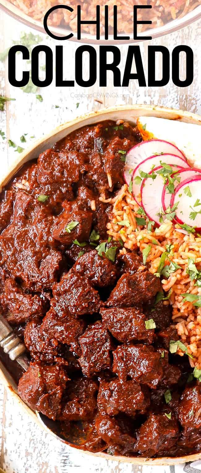 a bowl filled with chili and rice next to a plate full of meat