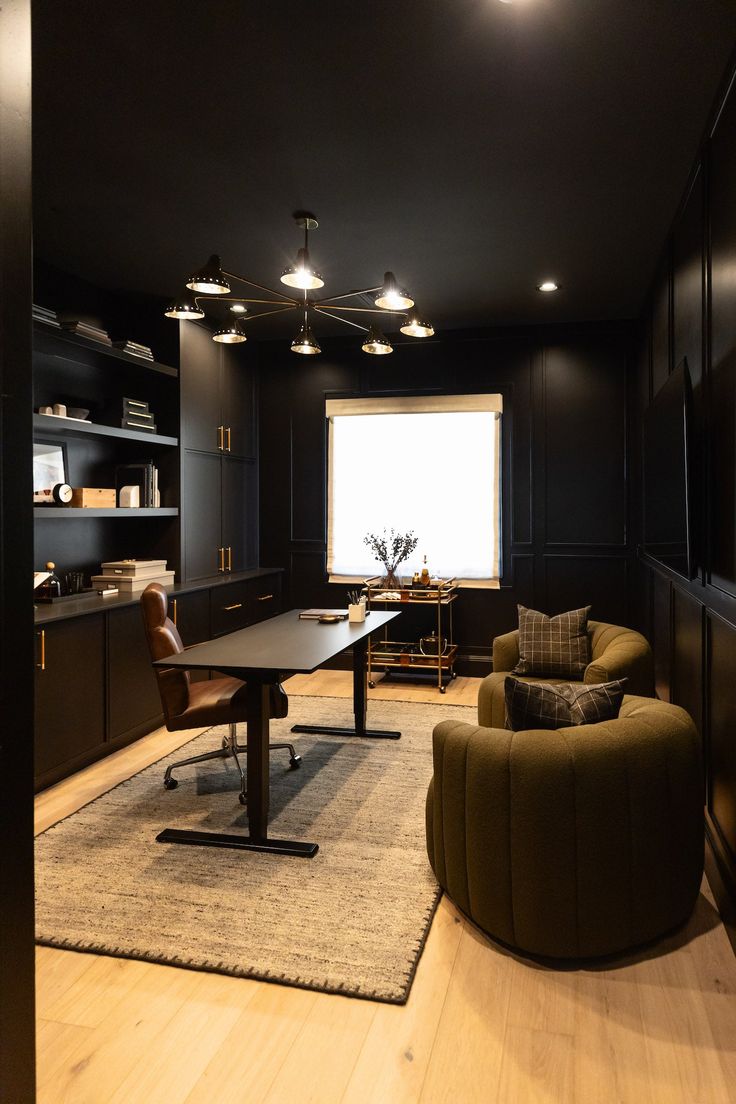 a living room filled with furniture next to a window