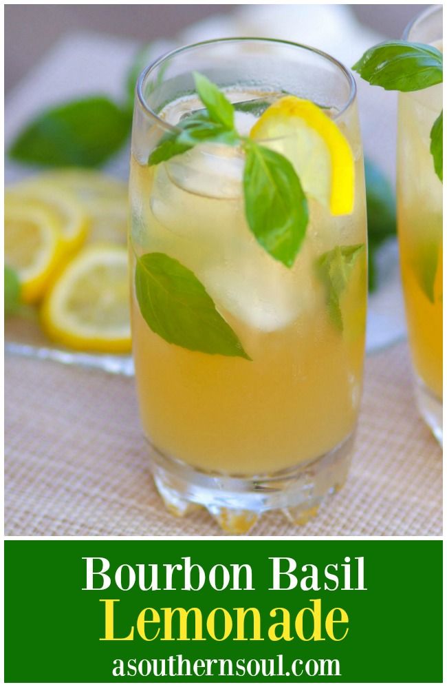 two glasses filled with lemonade and mint garnish on top of a table