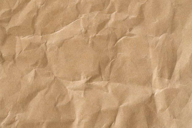 a piece of brown paper that has been wrinkled