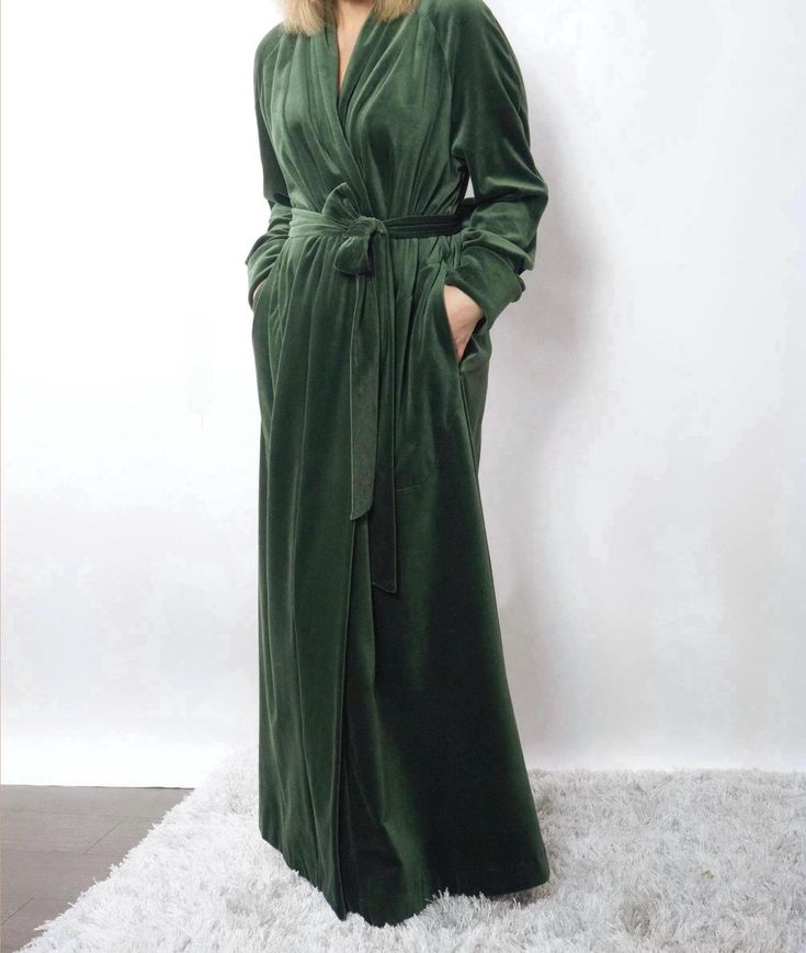 All my robes - https://www.etsy.com/shop/HBStyleEU Long velvet robe with 2 pockets, long sleeves, belt loops and belt. The fabric is wonderfully velvety and silky, soft and pleasant to the touch. - 100% Organic Cotton. - The model is wearing a dark green colored robe. SIZING SIZE S Bust: fits bust around 32"-36"/ 82-92 cm Hips: fits hips around 35"-39"/ 89-99 cm SIZE M Bust: fits bust around 35"-39"/ 89-99 cm Hips: fits hips around 38"-42"/ 97-107 cm SIZE L Bust: fits bust around 38"-42"/ 97-107 cm Hips: fits hips around 41"-45"/ 104-114 cm SIZE XL Bust: fits bust around 41''-45''/ 104-114 cm Hips: fits hips around 44''-48'' / 112-122 cm The width of the robe folded in half with a 6" (15cm) scent: XS - bust 39" (99cm), waist 38,5" (98cm), hips 42,5" (108cm) S - bust 40,5" (103cm), waist 40 Luxury Green Robe For Women, Green Long Sleeve Sleep Dress, Long Sleeve Green Robe For Fall, Long Cotton Robe For Fall, Green Cotton Loungewear Dress, Long Sleeve Cotton Robe For Hospital, Green Cotton Dress For Loungewear, Green Cotton Lounge Dress, Long Cotton Sleep Robe