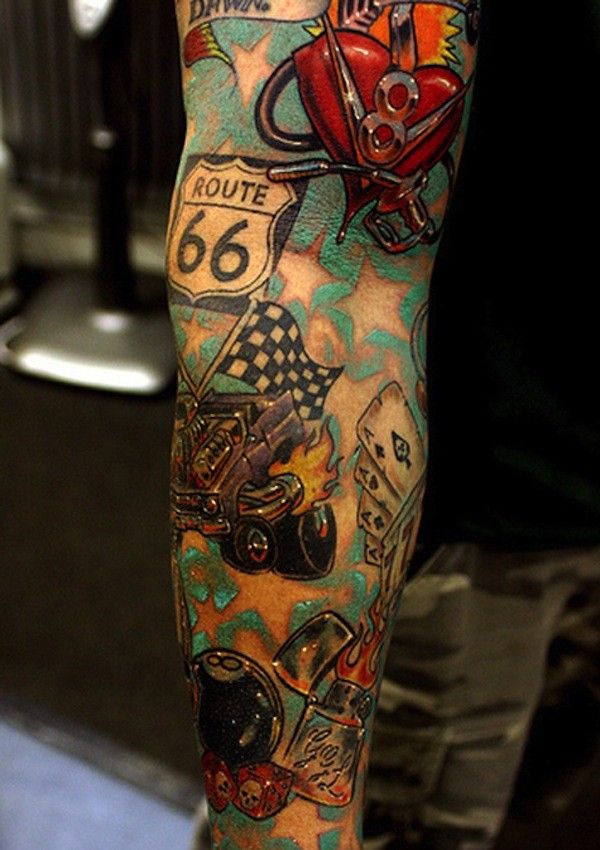 a man's arm with tattoos on it