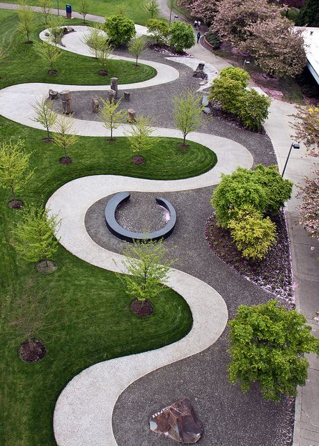 an aerial view of a circular garden area