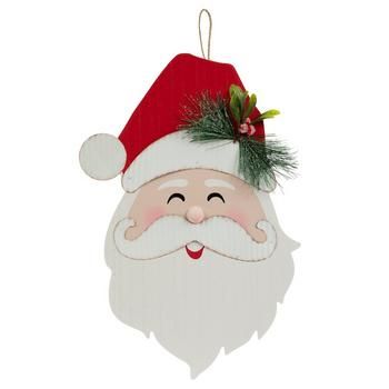 a wooden ornament with a santa clause on it's face and green hair