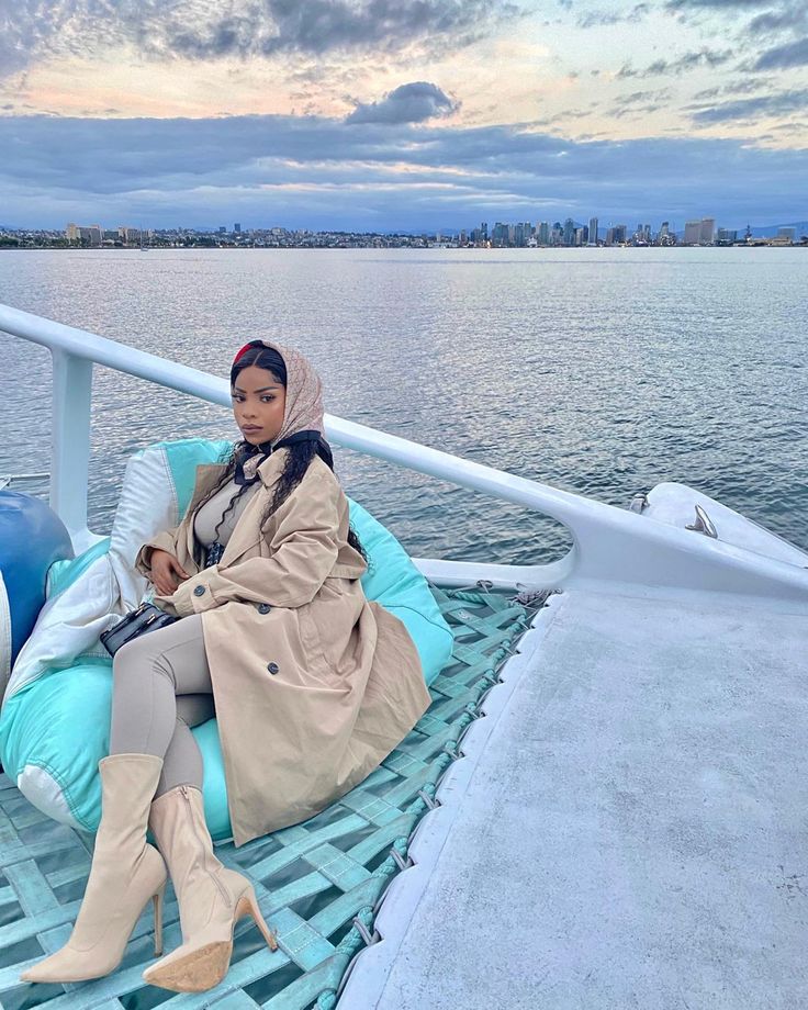 Black luxury, Evening Boat ride! high fashion outfit paired with a nude trench coat, nude booties and a Gucci head scarf! @Magggiemae_ on instagram Fall Boat Ride Outfit, Winter Boating Outfit, Gucci Head Scarf, Boat Ride Outfit, Nude Outfits, Boating Outfit, High Fashion Outfits, Boat Ride, Tomboy Outfits