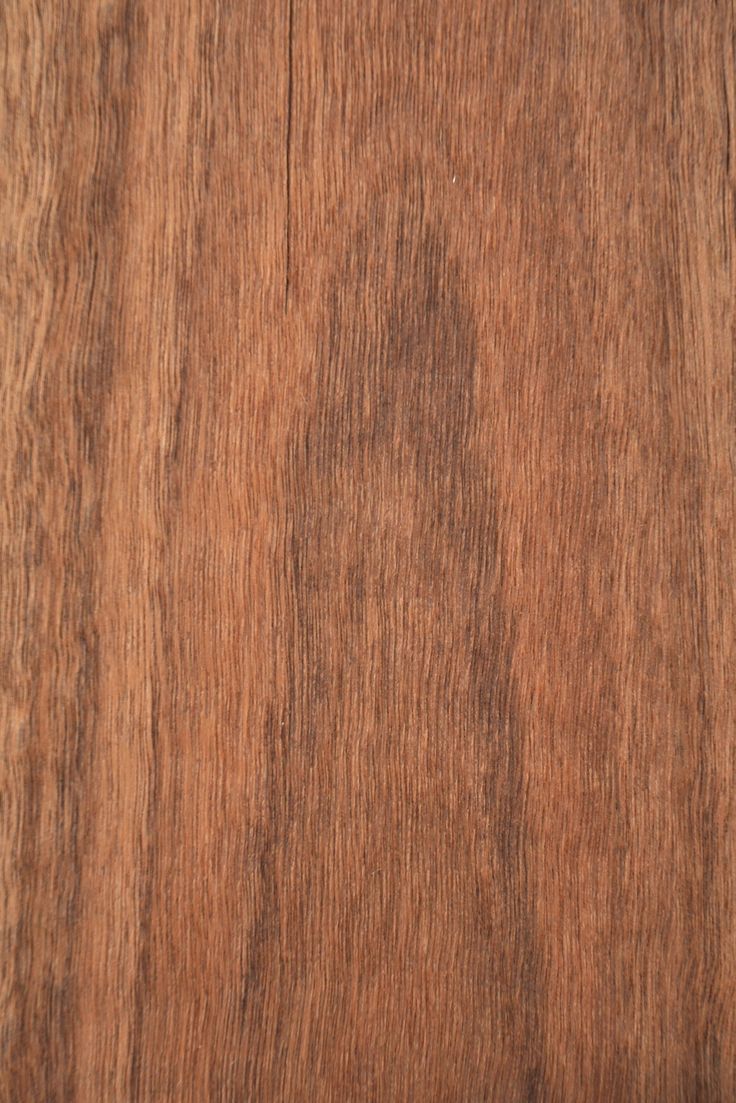 an image of wood grain textured with dark brown stain on the top and bottom