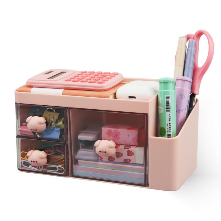 a pink desk organizer with piggy pigs and office supplies in it's bins