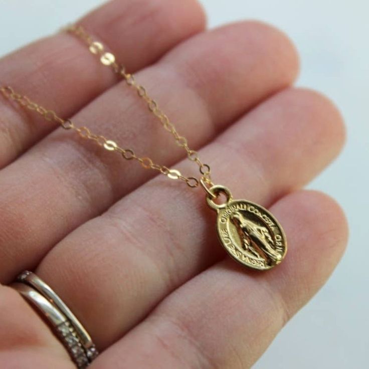 Gorgeous Virgin Mary Necklace Measuring 1/2" On 14k Gold Filled Chain, Jumprings, Clasp. Pendant Is 14k Gold Plated. Measures 18" Made In United States Mary Necklace, Virgin Mary Necklace, Catholic Jewelry, Gold Filled Chain, 2 On, Virgin Mary, Womens Jewelry Necklace, Gold Filled, Gold Plate