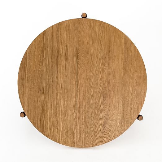 a round wooden object on a white background