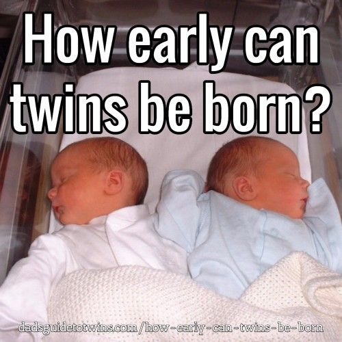 two twin babies sleeping in a crib with the caption how early can twins be born?