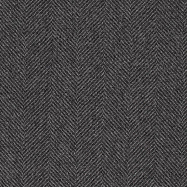 dark grey herring fabric textured upholstered to the surface with an interesting pattern