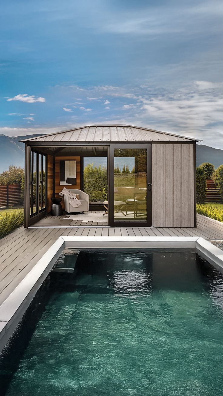 a pool house with a hot tub in the middle