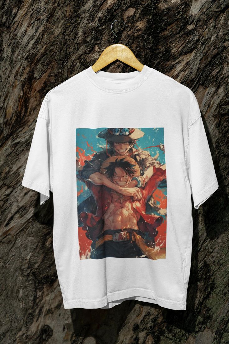 Celebrate the unbreakable bond between Ace and Luffy with this vibrant One Piece t-shirt! Featuring stunning fan art of the iconic brothers, this tee is a must-have for any One Piece fan. Made from 100% ethically sourced US cotton, this high-quality shirt combines comfort, style, and durability, making it the perfect choice for casual wear, anime conventions, or as a special gift for fans of the legendary pirate duo.     Epic Design: Bold and heartwarming fan art of Ace and Luffy showcasing their brotherly bond ️     Material: 100% cotton for a soft, breathable feel 🌿     Fit: Classic fit with a crew neckline for a timeless, relaxed look     Durability: Ribbed knit collar ensures long-lasting shape retention, with tear-away label for irritation-free comfort     Seamless Sides: No side sea Anime Events, One Piece T Shirt, Ace And Luffy, One Piece Ace, Anime Tshirt, Anime T Shirt, Anime Shirt, Art Anime, High Quality T Shirts