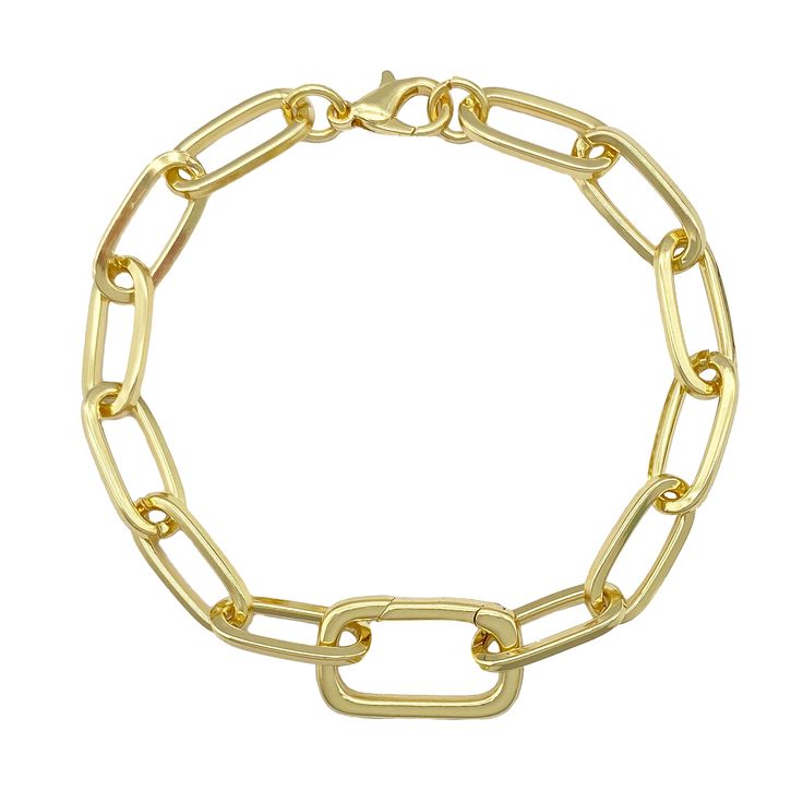 a gold chain bracelet with an oval link on the front and center, set against a white background