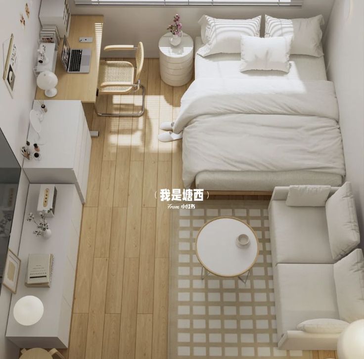 an aerial view of a small bedroom and living room