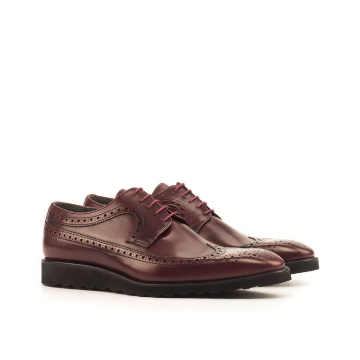 Similar to a Full Brogue, the Long Wingtip Blucher is unique in that one brogue panel extends from the toecap all the way to the heel of the shoe. Like a Full Brogue, the Long Wingtip Blucher is a classic style suitable for formal occasions and office wear alike. The Details: Materials: burgundy painted calf Sole: black sportwedge The Fine Print: Shoe production timeline/shipping can vary from 20-40 days from the date of order. All shoes are handmade, small tiny changes or imperfections are natu Luxury Wingtip Lace-up Business Shoes, Luxury Wingtip Lace-up Shoes For Business, Classic Brogue Oxfords For Derby, Elegant Plain Toe Oxfords For Derby, Formal Cap Toe Oxford Derby Shoes, Formal Oxford Cap Toe Derby Shoes, Formal Oxford Lace-up Shoes With Goodyear Welt, Cap Toe Derby Shoes For Formal Occasions, Timeless Brogue Oxfords For Derby