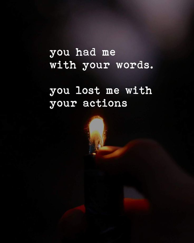 someone holding a lit candle with the words you had me with your words