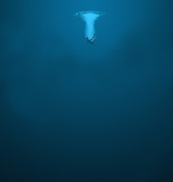 an underwater view of the ocean with a boat in the water and light shining on the surface