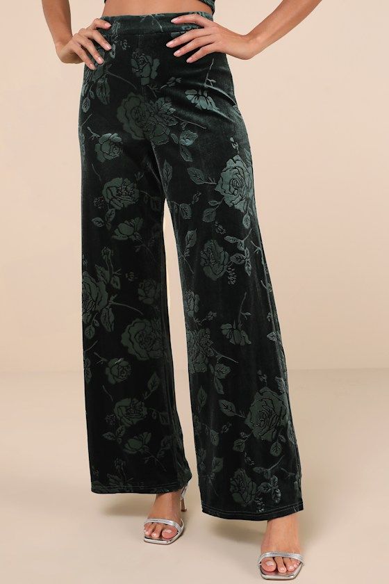 With stylish and sophisticated vibes aplenty, we can't get enough of the Lulus Sensational Attitude Emerald Green Burnout Velvet Wide-Leg Pants! Stretchy, plush velvet boasts a chic burnout floral effect as it shapes these elevated pants that have a high waist and wide, breezy legs that end at ankle-length hems. Hidden zipper/clasp at the back. Pair with the matching top for a complete look! Fit: This garment fits true to size. Length: Floor length. Size medium Inseam: 31.00 Front Rise: 13.50 Wa Elegant Green Relaxed Fit Pants, Elegant Wide Leg Velvet Bottoms, Floral Velvet Pants, Luxury Elegant Velvet Wide Leg Pants, Chic Wide-leg Velvet Pants, Luxury Velvet Wide-leg Pants, Velvet Pants, Matching Top, Ankle Length