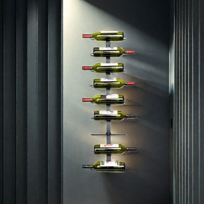 a wall mounted wine rack with several bottles on it's sides and lights in the middle