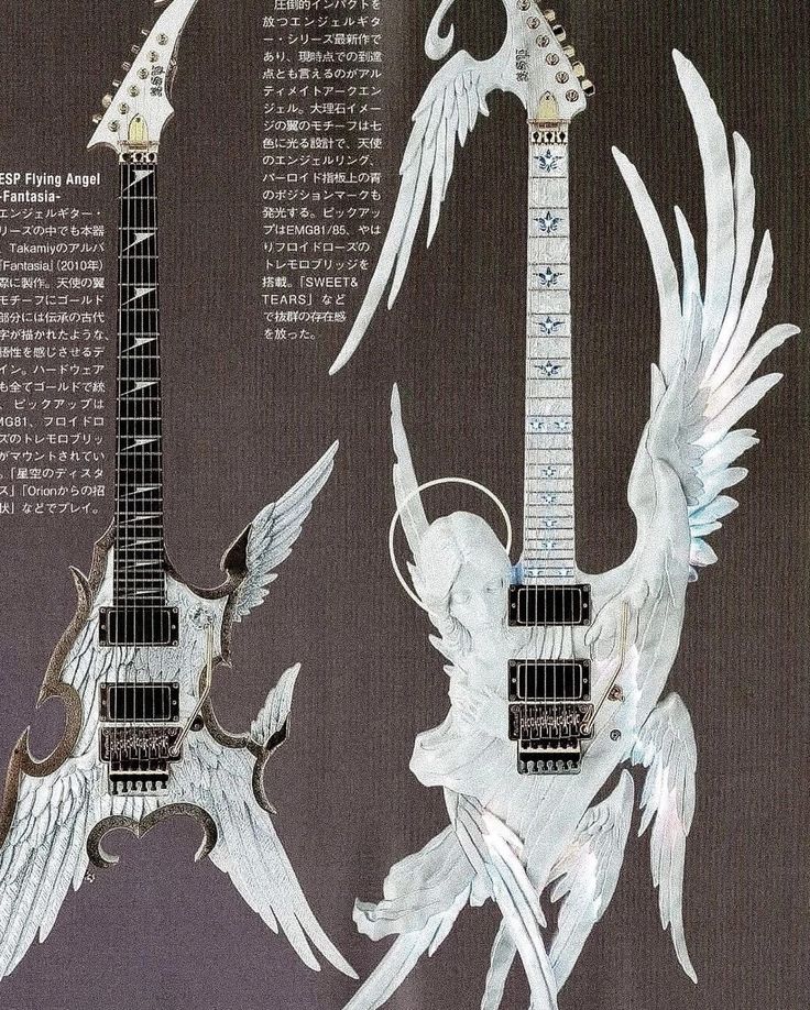 two guitars with angel wings on them