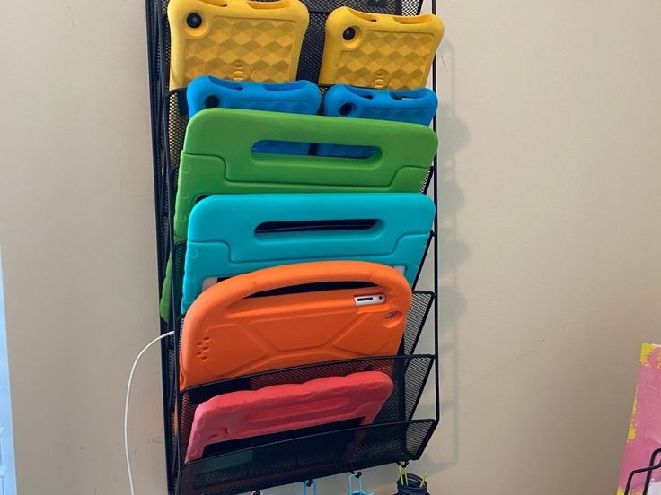 there is a rack with many different cases on it