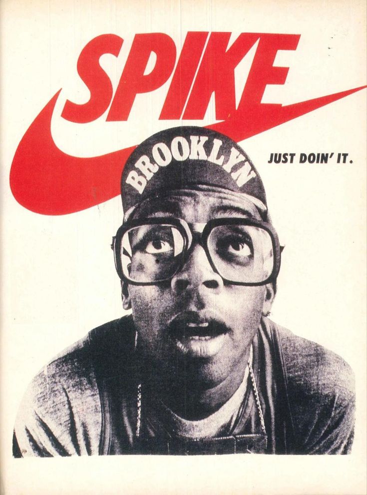 a black and white photo of a man wearing glasses with the words spike on it