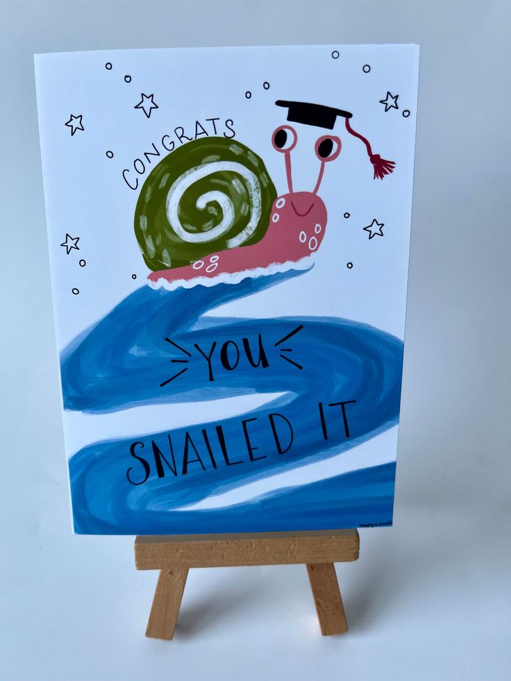 a card with an image of a snail on it