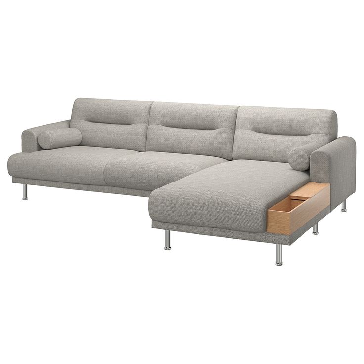 a gray couch with a wooden foot rest and storage drawer on the right side, against a white background