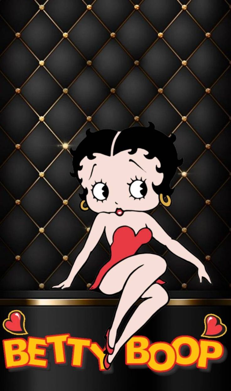 betty boop is sitting on the back of a couch